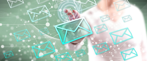 Woman touching an e-mail concept © thodonal