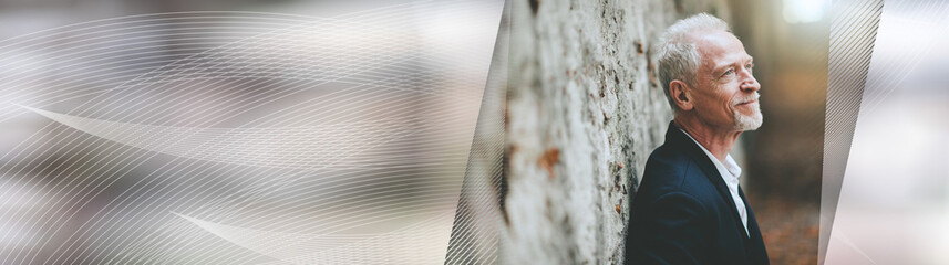 Portrait of handsome mature man, light effect. panoramic banner