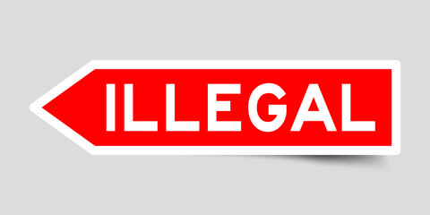 Arrow shape red color sticker in word illegal on gray background