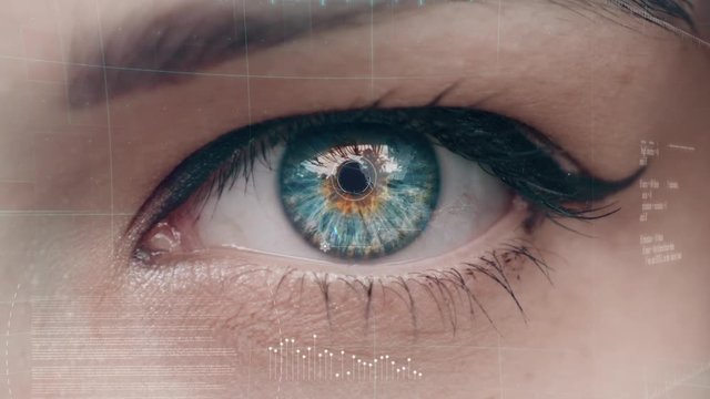 Digital composite of Blinking eye with tech interface