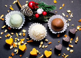 Different truffles on a dark background