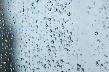 Naklejka na ściany i meble texture of water droplets on a double pane or window. abstraction background. for design and decoration. defocused drops. Blurred