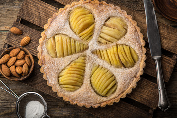 poached pear and almond frangipane tart