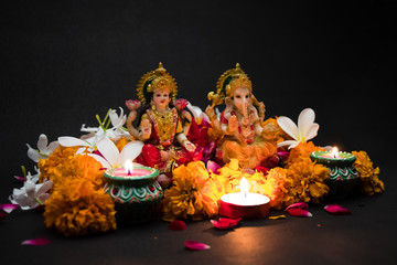 The Lord Ganesha and Goddess Laxmi - Hindu religion and Indian celebration of Diwali festival