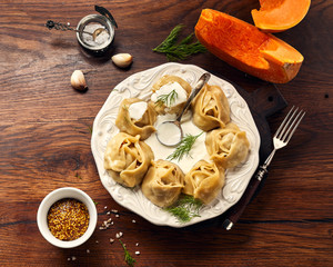 Asian steamed dumplings Manti with pumpkin and garlic.