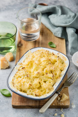 cauliflower and cheese gratin in baking dish