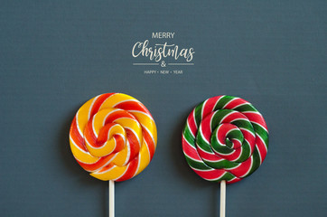 Merry Christmas and Happy New Year. Colorful lollipops