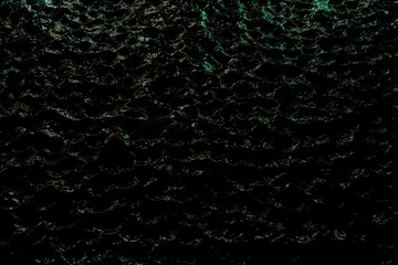 nice festive bright dark water - abstract background of electric lights reflected in black liquid