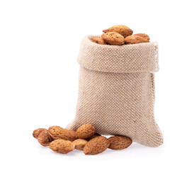 Almonds nut in sack isolated on white background