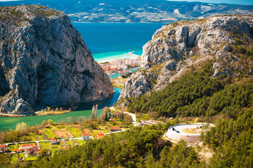 Cetina river canyon and mouth in Omis view from above - obrazy, fototapety, plakaty