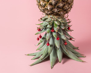 Christmas tree made of pineapple leaves. Holiday minimal concept.