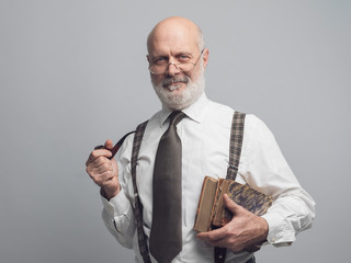 Academic professor posing and smoking a pipe