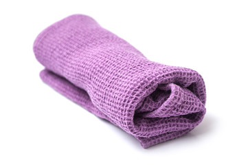closeup of purple cleaning towel on white background