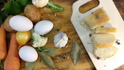 bread and vegetables on a cutting board