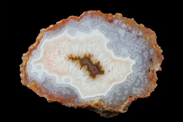 A cross-section of agate. Eyelet agate filled with quartz. Origin: Agouin, Atlas mountains, Morocco.