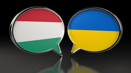 Hungary and United Kingdom flags with Speech Bubbles. 3D illustration