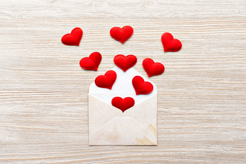 Fototapeta premium Envelope with hearts top view of the background. Valentine's day. 14 Feb.