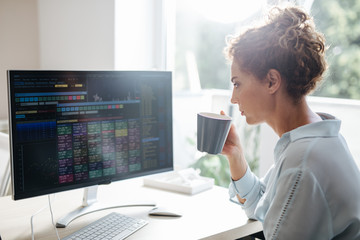 Businesswoman Working on a Desktop Computer