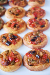Obraz na płótnie Canvas Freshly baked mini pizzas cocas