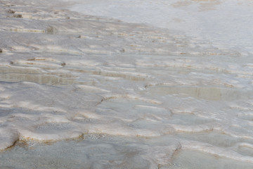 Geothermal sources and limestone deposits on the hillsides