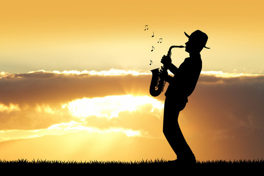 saxophonist man at sunset