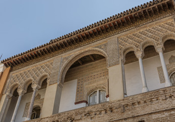 Fototapeta na wymiar Part of the facade of the Real Alcázar de Sevilla, a Moorish style building