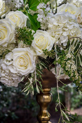Elegant White rose flower arrangement at a wedding