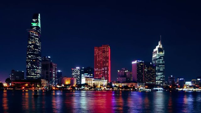 Time-lapse of Ho Chi Minh City from riverside at night, December 12, 2018 in Ho Chi Minh City, Vietnam.