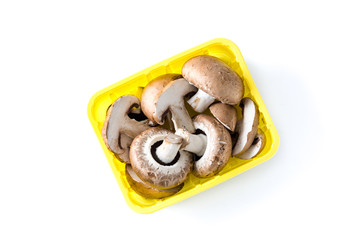 Mushrooms in yellow box isolated on white background. Top view