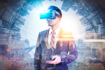 The abstract double exposure image of businessman using a smart glasses or vr glasses overlay with virtual hologram image. the concept of communication, internet of things and future life.