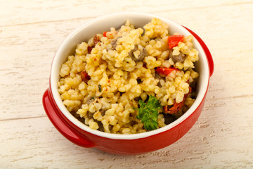 Bulgur with chicken hearts