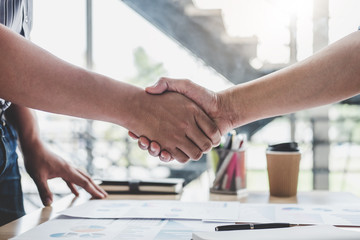 Finishing up a meeting, Business handshake after discussing good deal of Trading contract for both companies and gesturing people connection deal, Meeting and greeting concept
