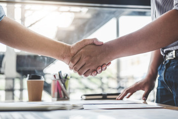 Finishing up a meeting, Business handshake after discussing good deal of Trading contract for both companies and gesturing people connection deal, Meeting and greeting concept