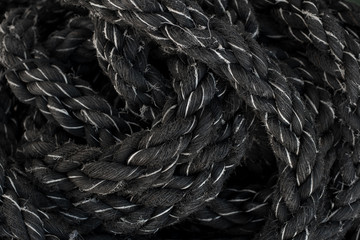 Black nautical rope.Close up.Rope background