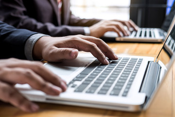 Professional businessman working, Doing finance on laptop, document graph and analysis business strategy to development profit