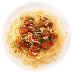 Spaghetti with meatballs with tomato sauce and cheese. Isolated on white background. View from above.