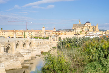 Roman bridge and cathedral - mosque by the river in Cordoba, Andalusia, Spain