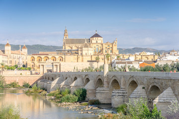Roman bridge and cathedral - mosque by the river in Cordoba, Andalusia, Spain