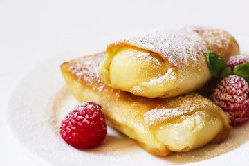 Close up of Cheese Blintz on white background, selective focus