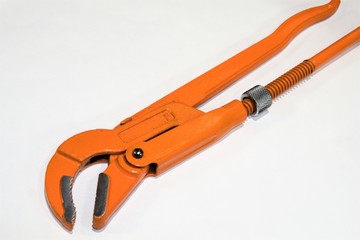 Excellent orange pipe wrench on a white background.