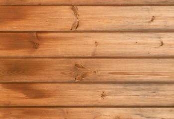Old wooden shield with knots and cracks