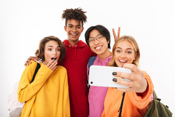 Group of cheerful teenagers isolated