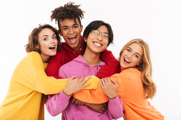 Group of cheerful teenagers isolated