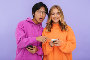 Cheerful multhiethnic teenage couple