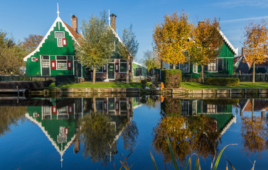Naklejka premium Zaanse Schans, Netherlands - considered a real open air museum, Zaanse Schans presents a collection of well-preserved historic windmills and houses