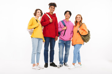 Group of cheerful teenagers isolated