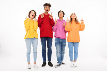 Group of cheerful teenagers isolated