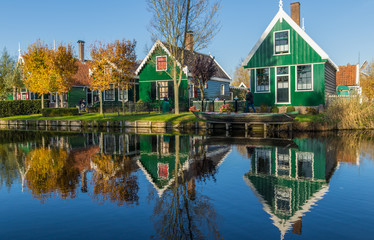 Obraz premium Zaanse Schans, Netherlands - considered a real open air museum, Zaanse Schans presents a collection of well-preserved historic windmills and houses