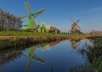 Fototapeta premium Zaanse Schans, Netherlands - considered a real open air museum, Zaanse Schans presents a collection of well-preserved historic windmills and houses