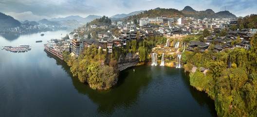 Furong, Hunan, China. The Wangcun Waterfall at Furong Ancient Town. - obrazy, fototapety, plakaty